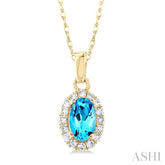 5x3 MM Oval Shape Blue Topaz and 1/20 Ctw Single Cut Diamond Halo Semi-Precious Pendant with Chain in 10K Yellow Gold