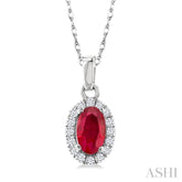 5x3 MM Oval Shape Ruby and 1/20 Ctw Round Cut Diamond Halo Precious Pendant with Chain in 10K White Gold