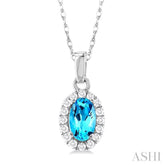 5x3 MM Oval Shape Blue Topaz and 1/20 Ctw Round Cut Diamond Halo Semi-Precious Pendant with Chain in 10K White Gold