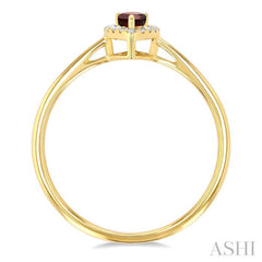 5x3 MM Pear Shape Garnet and 1/20 ctw Single Cut Diamond Halo Semi Precious Ring in 14K Yellow Gold