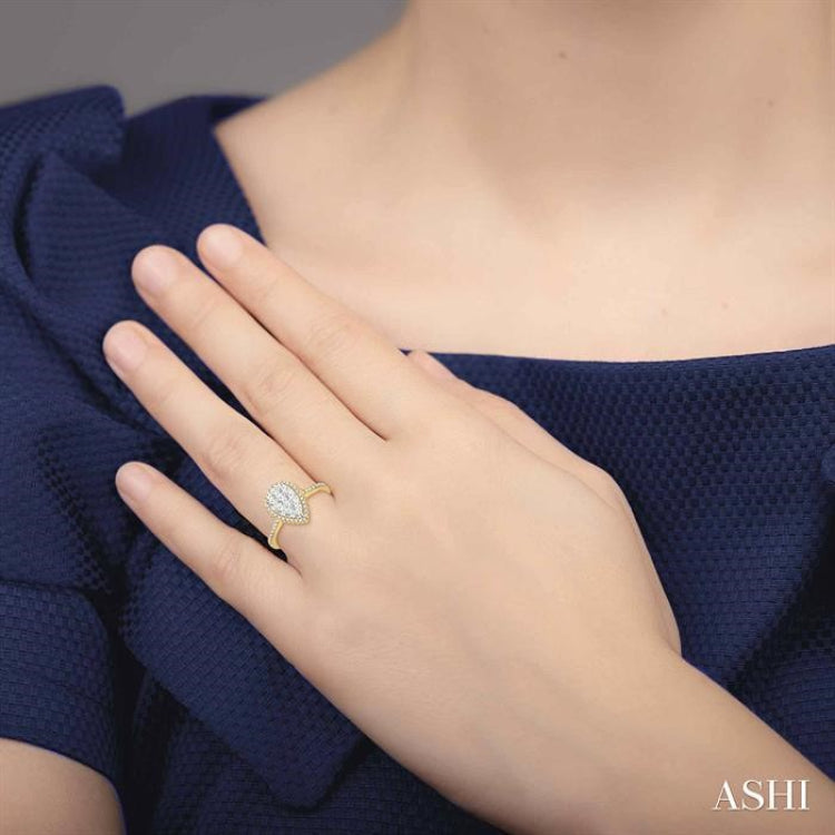 3/4 Ctw Pear Shape Diamond Lovebright Ring in 14K Yellow and yellow and white gold