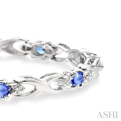 4x3mm Oval Cut Tanzanite and 1/10 Ctw Single Cut Diamond Bracelet in 10K White Gold