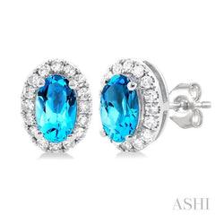 5x3 MM Oval Shape Blue Topaz and 1/8 Ctw Single Cut Diamond Halo Semi-Precious Stud Earrings in 10K White Gold