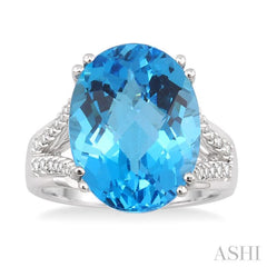 16x12 MM Oval Cut Blue Topaz and 1/4 Ctw Round Cut Diamond Semi-Precious Ring in 14K White Gold