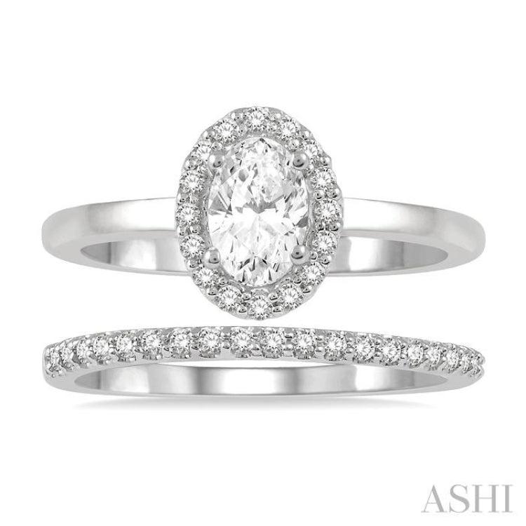 3/8 Ctw Round Cut Diamond Wedding Set With 1/3 Ct Halo 1/4 Ct Oval Cut Center Stone Engagement Ring and 1/10 Ct Wedding Band in 14K White Gold