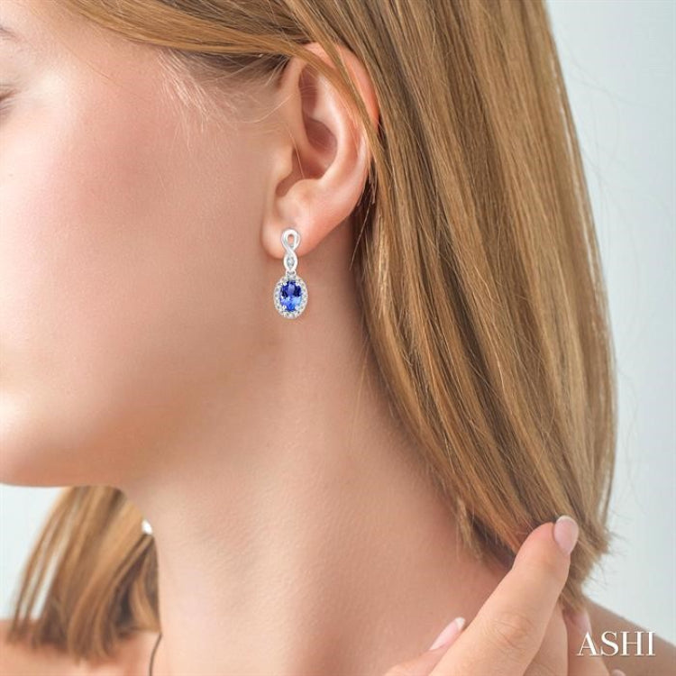 5x3 MM Oval Cut Tanzanite and 1/6 Ctw Round Cut Diamond Earrings in 14K White Gold