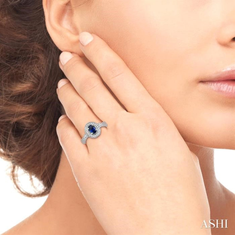 6x4 MM Oval Cut Sapphire and 1/5 ctw Round Cut Diamond Ring in 14K White Gold