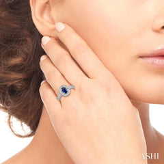 6x4 MM Oval Cut Sapphire and 1/5 ctw Round Cut Diamond Ring in 14K White Gold
