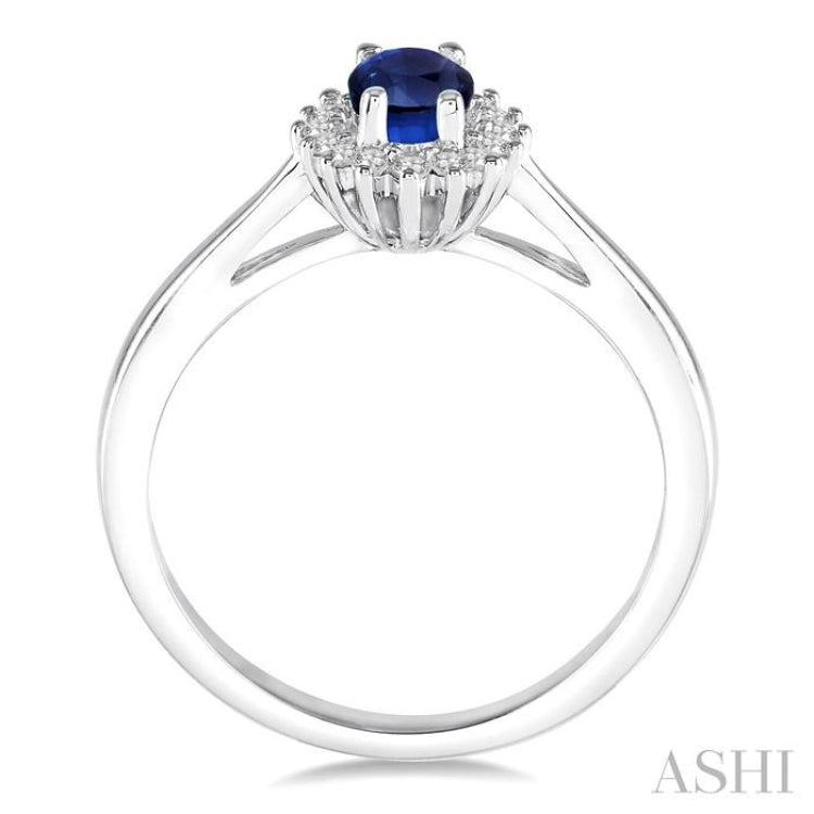 6X4 MM Oval Cut Sapphire Center and 1/8 ctw Round Cut Diamond Halo Precious Stone Ring in 10K White Gold