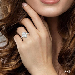 3/4 ctw Pear Shape Lovebright Round Cut Diamond Ring in 14K White and Yellow Gold