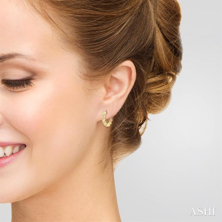 1/5 Ctw Petite Swirl Round Cut Diamond Fashion Huggies in 10K Yellow Gold
