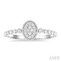 1/8 ctw Petite Bead Shank Oval Center Round Cut Diamond Fashion Ring in 10K White Gold